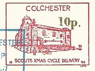 Building with cyclist passing in front