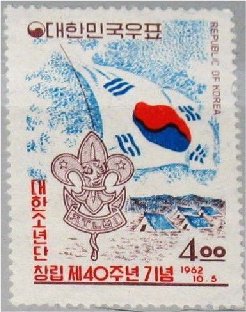 Scout emblem, flag and tents