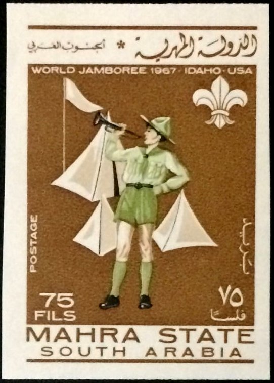 Scout bugler before tents